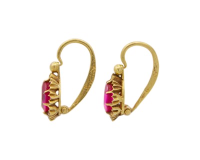 Lot 26 - A pair of high-purity gold with synthetic ruby earrings.