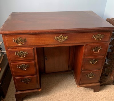 Lot 3102 - A late George II mahogany kneehole dressing...