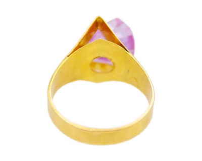 Lot 35 - An unusual design, 21k gold CZ dress ring.