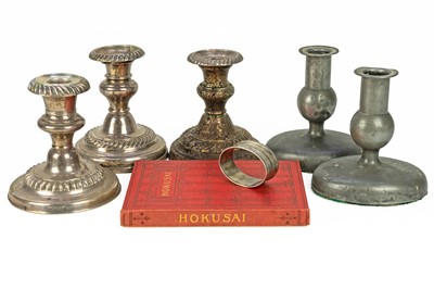 Lot 195 - Three loaded silver piano candlesticks.