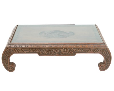 Lot 398 - A Chinese carved hardwood opium table.