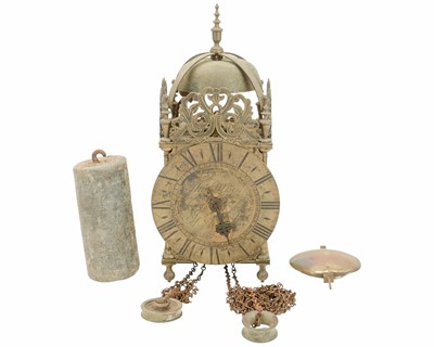 Lot 903 - A brass weight driven lantern clock, signed Thos Moore, Ipswich.