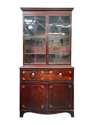 Lot 980 - A George III secretaire bookcase.