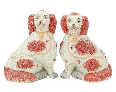 Lot 356 - A pair of Staffordshire style spaniel ornaments of large proportions.