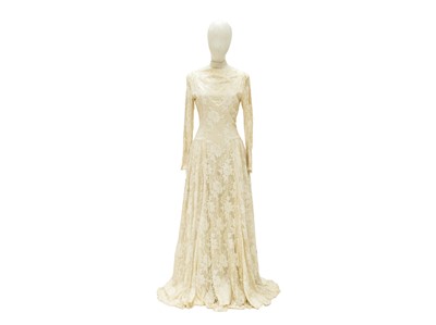 Lot 549 - A lace wedding dress.