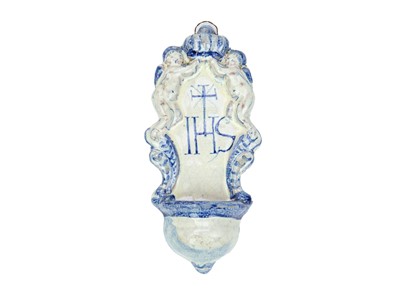 Lot 689 - A Faïence tin glaze stoop.