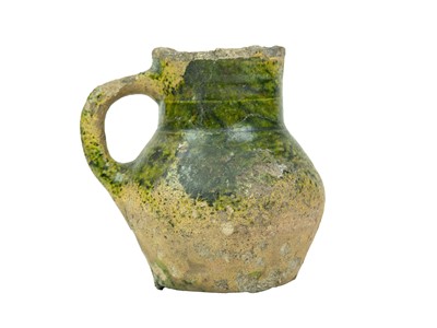 Lot 601 - An English medieval jug.