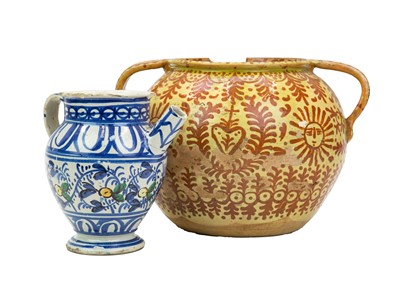 Lot 751 - A Continental faience twin handled jar.