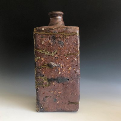 Lot 525 - A textured studio pottery slab bottle vase,...