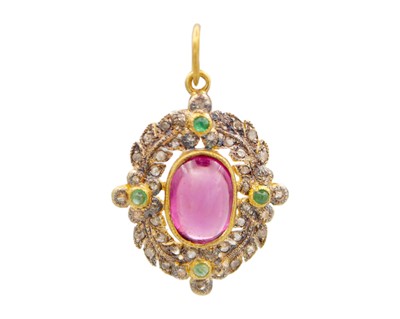 Lot 63 - A Victorian-style silver gilt, almandine garnet, diamond, and emerald pendant.