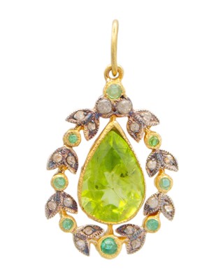 Lot 57 - A silver gilt, peridot, diamond, and emerald pendant.