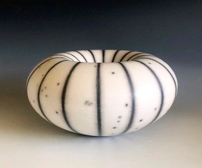 Lot 527 - Tim ANDREWS A stripe resist 'Humbug' raku vase,...