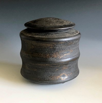 Lot 528 - A Jason Wason black stoneware lidded pot with...