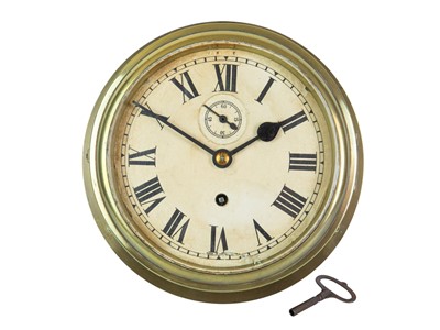 Lot 900 - A ship's brass bulkhead timepiece.