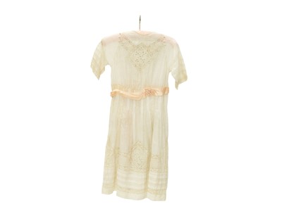 Lot 566 - A girl's dress, circa 1900.