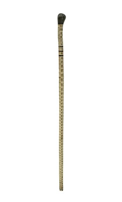 Lot 48 - A folk art shark vertebrae walking stick/cane.