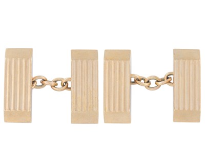 Lot 267 - A pair of solid 9k gold faceted design cufflinks.