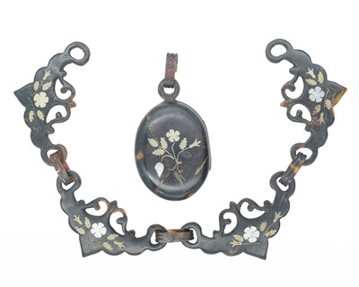 Lot 270 - A Victorian Mother-of-Pearl and white metal inlaid tortoiseshell locket and choker.