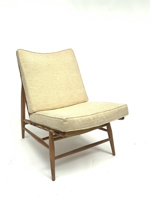 Lot 3240 - A scarce Ercol model 427 beech lounge chair...