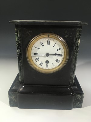 Lot 2902 - A black slate and marble mantle timepiece,...
