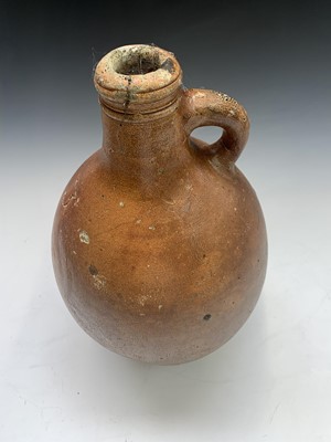 Lot 1 - A German Stoneware jar. Height 40.5cm.