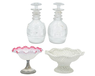 Lot 529 - A pair of George III triple ring neck cut glass decanters and stoppers.