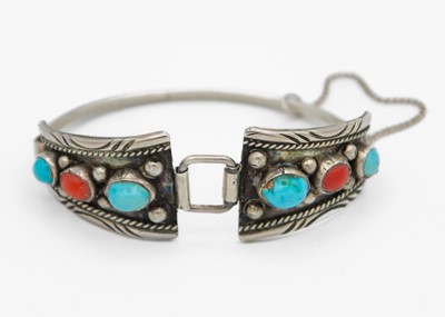 Lot 3 - A native American Navajo silver turquoise and coral set bracelet, probably by Jerome Begay.