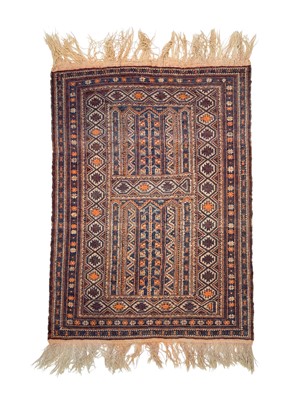 Lot 488 - A Baluch prayer rug.