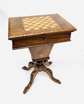 Lot 3075 - A Victorian walnut and inlaid games/work table,...