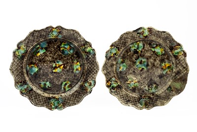 Lot 748 - A pair of mid-18th century Whieldon type tortoiseshell creamware plates.