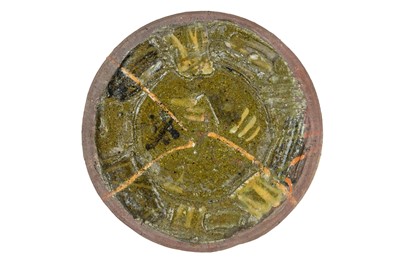 Lot 602 - Peter SMITH (1941-2025), a slip decorated circular dish.
