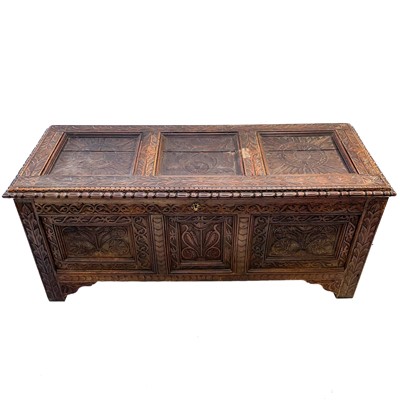 Lot 92 - A carved oak joined chest, substantially 17th century.