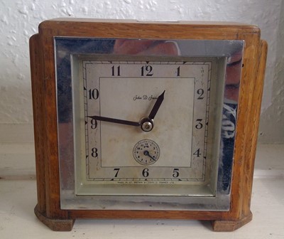 Lot 2916 - A small Art Deco oak and chrome mantel...