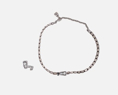 Lot 75 - UNO DE 50 - a silver 'crystal' set ring and matching necklace.