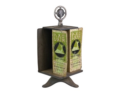 Lot 95 - A French cast iron and tinplate counter top advertising display.