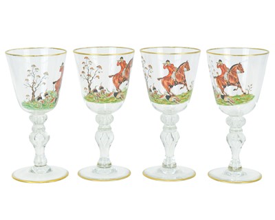Lot 518 - A set of four hand painted glasses.