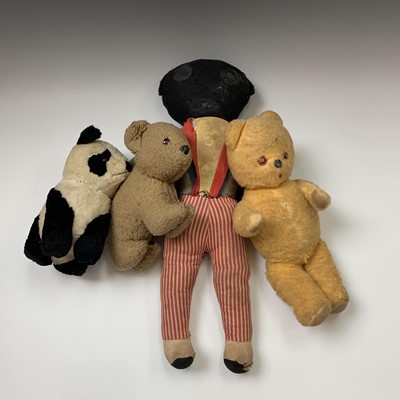 Lot 593 - A Golliwog, length 54cm, and three other soft...