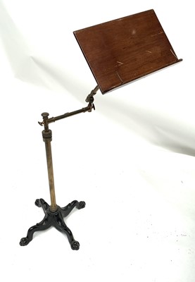 Lot 3069 - A George V mahogany, brass and cast iron music...