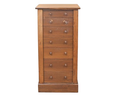 Lot 832 - A late Victorian mahogany and stained beech Wellington chest.