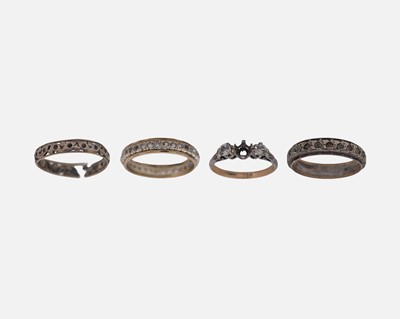 Lot 87 - Four 9k and silver rings.