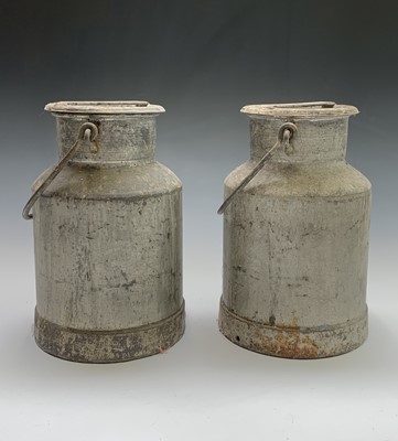 Lot 55 - A pair of small alumium milk churns. Height...