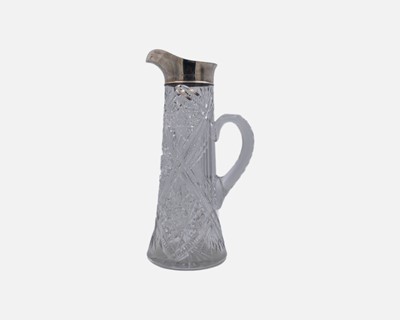 Lot 149 - A George V silver-mounted heavy cut glass lemonade or water jug by Docker & Burn Ltd.