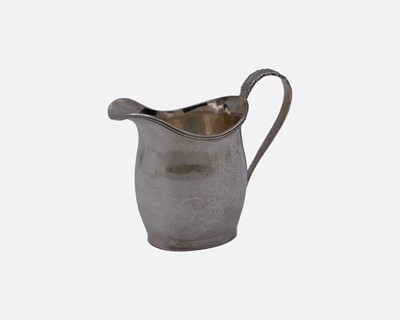 Lot 119 - An Edwardian silver, Georgian style, cream jug by George Nathan & Ridley Hayes.