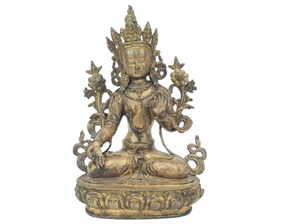 Lot 315 - A Sino-Tibetan gilded bronze figure of Green Tara.