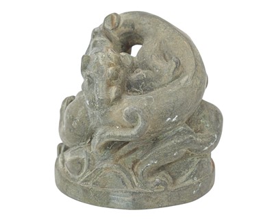 Lot 370 - A small Chinese bronze group of fighting dragons.