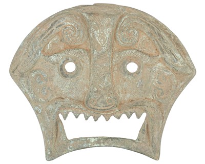 Lot 335 - A Chinese bronze buckle mask.