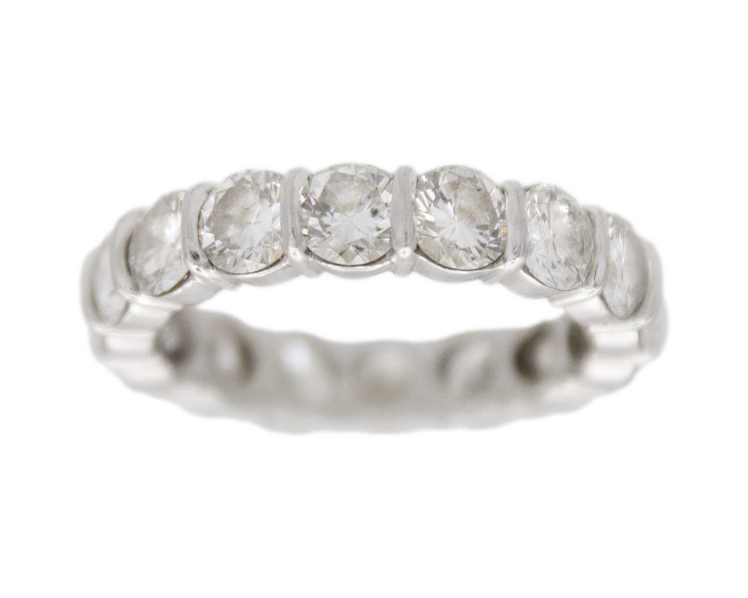 Lot 65 - A good platinum 4.00ct diamond set full eternity ring.