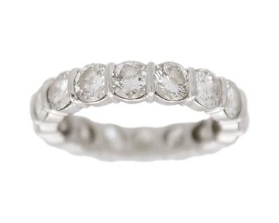 Lot 65 - A good platinum 4.00ct diamond set full eternity ring.