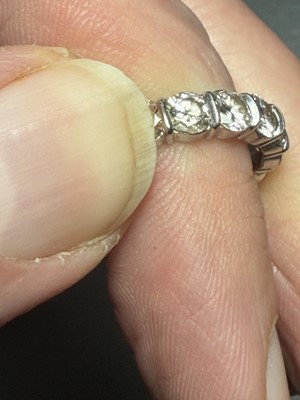 Lot 65 - A good platinum 4.00ct diamond set full eternity ring.
