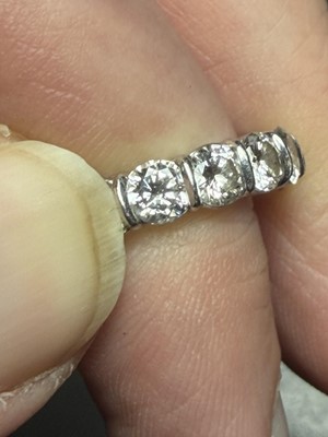 Lot 65 - A good platinum 4.00ct diamond set full eternity ring.
